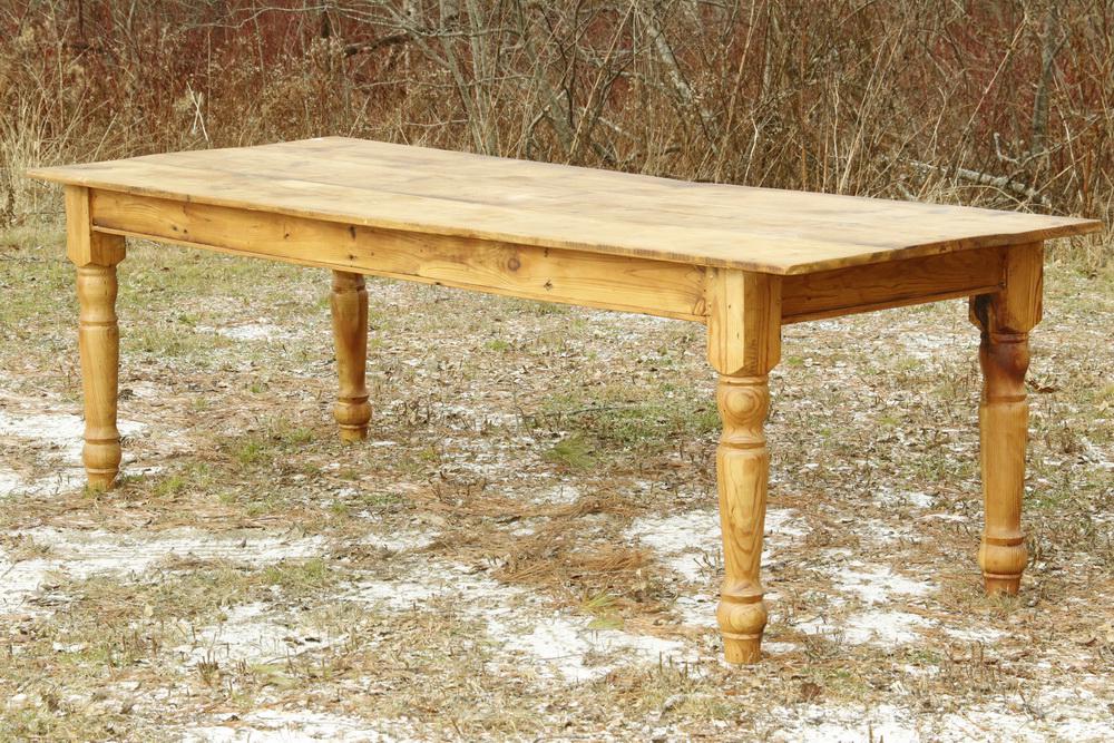 PINE HARVEST TABLE: Contemporary Rough Sawn Yellow Pine Country Table with a thick plank top, deep skirt and turned butcher block legs, 30 1/2" x 96" x 35". Very good condition.