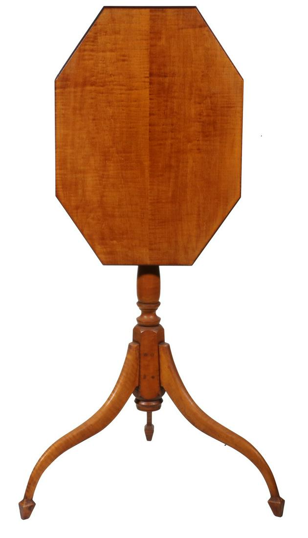 ELDRED WHEELER CANDLE STAND: Tiger Maple Tilt Top Candle Stand by Eldred Wheeler, Hingham, MA, with octagonal top, turner pedestal, tripod base with spade feet, branded and with Eldred Wheeler paper label on underside, 29 1/4" hi