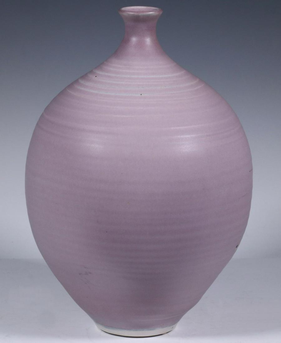 OTTO HEINO (NH/CT/CA, 1915-2009) PORCELAIN VASE: Lavender Glazed Teardrop Form Studio Pottery Vase, by Otto Heino, incised 'Otto' and '02' (2002) on base, 12" high, 7" diam. One small glaze flaw to side.