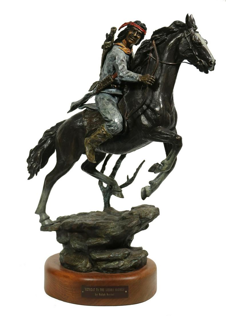 RALPH ROYBAL (NM, 1955 - ): 'Retreat to the Sierra Madres', cast and patinated bronze, signed on plinth and with title block on wooden mount, dated 1989, numbered 22/30, with painted detail, depicting an Apache warrior on his ho