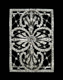 FRANK WALTER LAWRENCE, EDWARDIAN PLATINUM & DIAMOND: Fine Handmade Brooch/Buckle has a 1.0 ct. old European cut center stone of "G" color and VS2 clarity. It is surrounded by (276) small diamonds with a total weight of 3.18 cts., color FG. Pin mechanism
