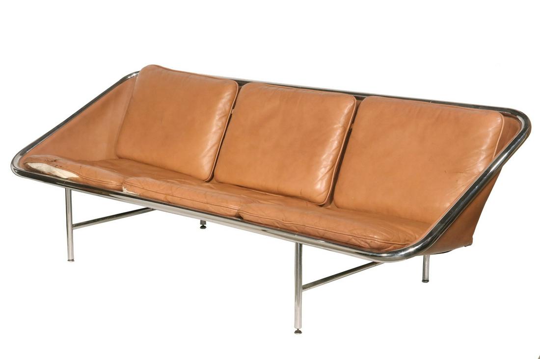 GEORGE NELSON (NY/CT/ITALY, 1908-1986) FOR HERMAN: Midcentury Modern Leather and Chrome Sofa, model 6832, designed by George Nelson and manufactured by Herman Miller, cushions in chestnut leather, set on a chrome tubular frame, Herman Miller label att