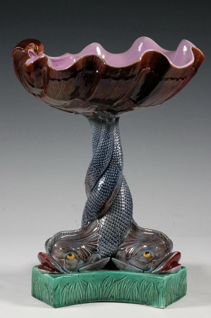 ENGLISH MAJOLICA COMPOTE: 19th c. English Shell and Dolphin Majolica Compote, with tridacna shell form bowl supported by a triple-dolphin form pedestal, probably by Holdcrofts Ltd. (Stoke-on-Trent, UK), unmarked, 13" high, 9 1