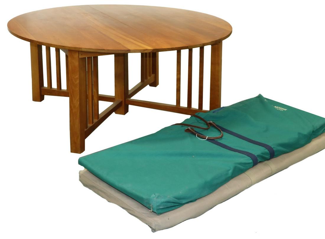 THOMAS MOSER "NEW CENTURY" DINING TABLE: Hand Crafted "New Century" Solid Cherry Round Dining Table by Thomas Moser, Craftsman style with slatted base, #6944, with two additional leaves in Thos. Moser bags, base marked 'Thos. Moser Cabinetma