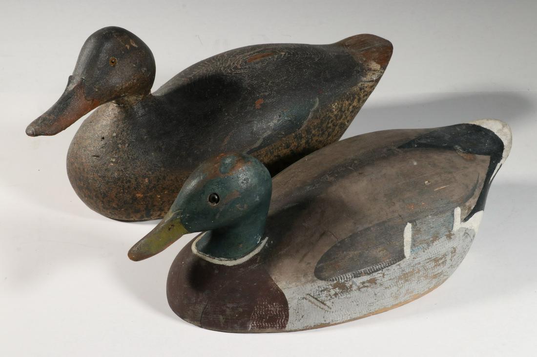 (2) DUCK DECOYS: (2) Carved and Painted Duck Decoys: Mason Premier Grade, in original paint, with glass eyes, 7 1/2" high, 16 3/4" x 6 1/4", some paint flaking, beak chip; and Ken Harris mallard decoy, with glass eyes