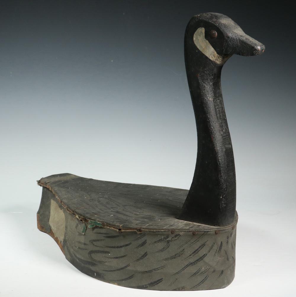 CANADA GOOSE DECOY BY PAUL K. MOSS: Painted Wood and Canvas Canada Goose Decoy, signed "Paul K. Moss, Oakland City", with flat hollow body, tack eyes, 16 1/2" high, 17 1/2" x 9 5/8". Canvas tears and losses, minor shrinkage cracks, pain