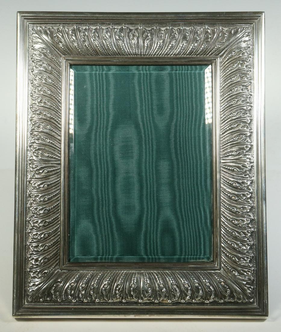 BUCCELLATI SILVER FRAME: Contemporary Italian Sterling Silver Picture Frame by Buccellati, with repousse decorated side panels, with glass and easel back, edge stamped with Italian hallmarks, '926' and 'Gianmaria Buccellati',