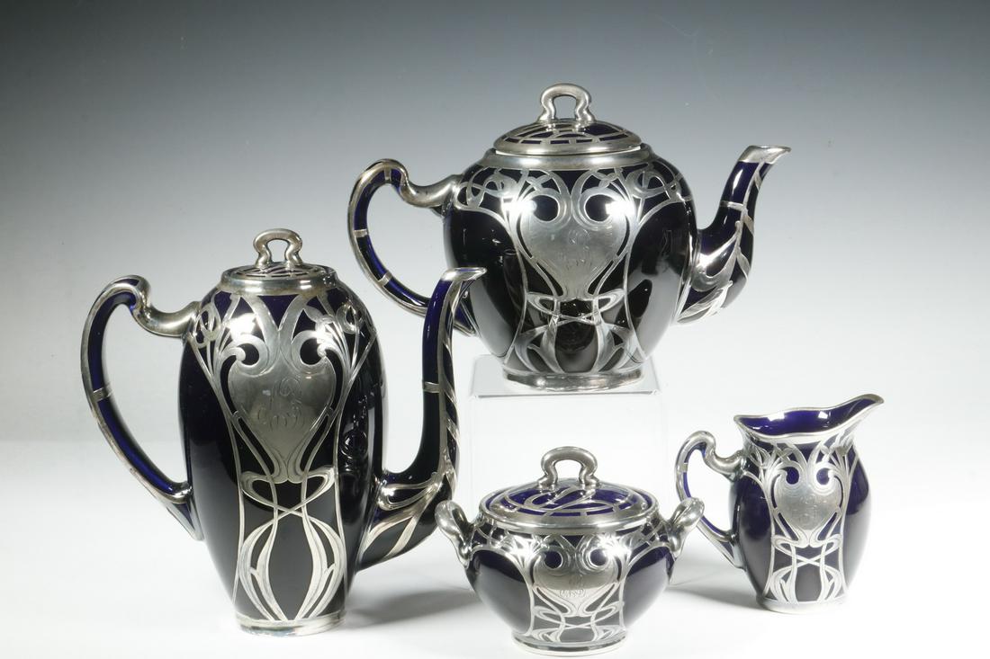(4 PC) LENOX BEVERAGE SERVICE WITH SILVER OVERLAY: Circa 1895 (4) Piece Art Nouveau Lenox Cobalt Glazed Porcelain Tea & Coffee Service with Sterling Silver Overlay, with 'MB' monogram, sugar and creamer with Lenox CAC (1892-96) and Mauser Manufacturin