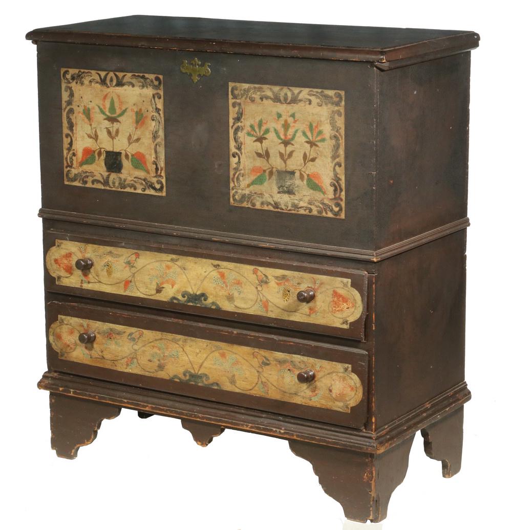 QUEEN ANNE PAINTED BLANKET CHEST: Country Queen Anne Lift Top Two-Drawer Blanket Chest, brown painted surface with later floral decoration, molded edge top with snipe hinges, drawers with later wooden pulls, shaped apron and bracket b