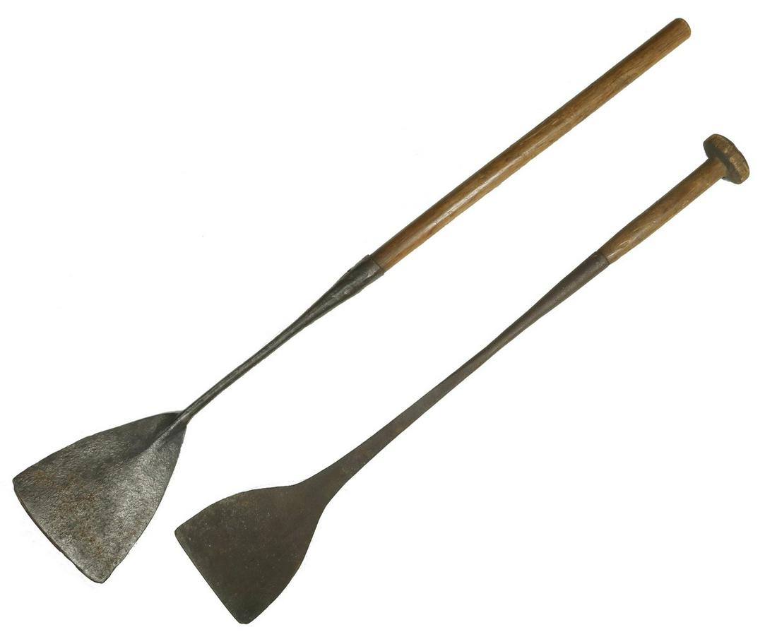 (2) 18TH C. WHALING TOOLS W/ HANDLES: Hand Forged Iron Flat Flensing Blades for cutting whale blubber, both with stamped makers or owners marks that are now illegible, one flanked by stars, both also retaining the wooden handles, 38" x 6