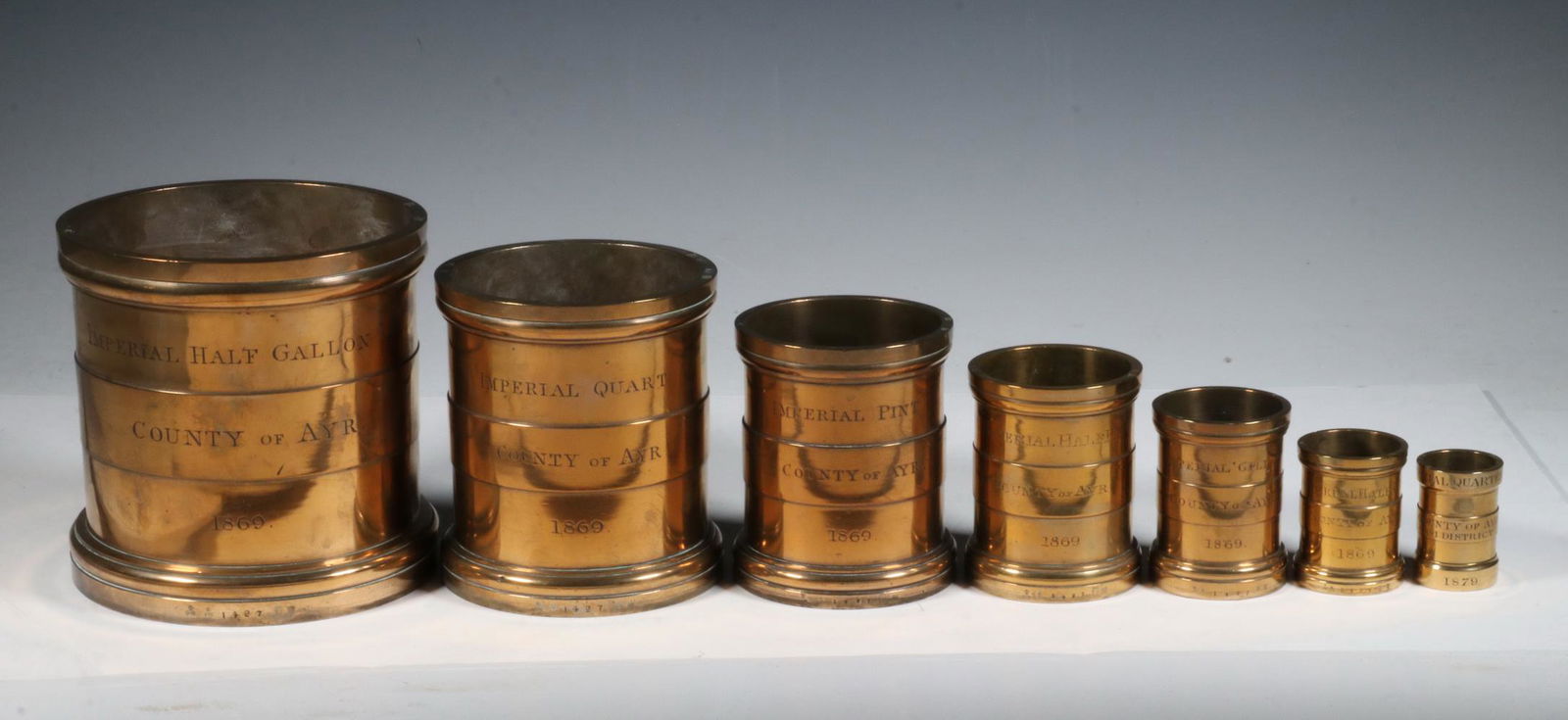 (7 PCS) BRITISH BRONZE IMPERIAL MEASURES SET, COUNTY OF (1 of 7)