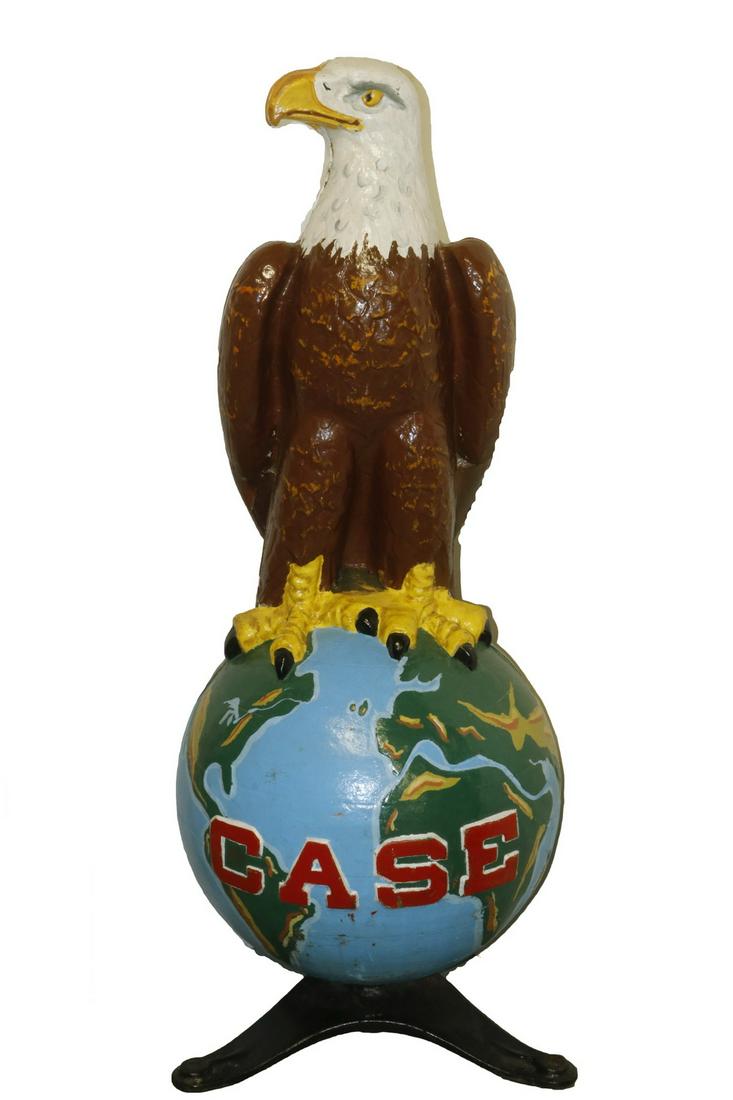 X-RARE PAINTED CAST IRON CASE MANUFACTURING TRADE SIGN: Circa 1920, substantial scale, with the American Eagle surmounting the Globe, which has the "Case" logo on it. These were presented to major dealers of the tractor and agricultural machinery made by t