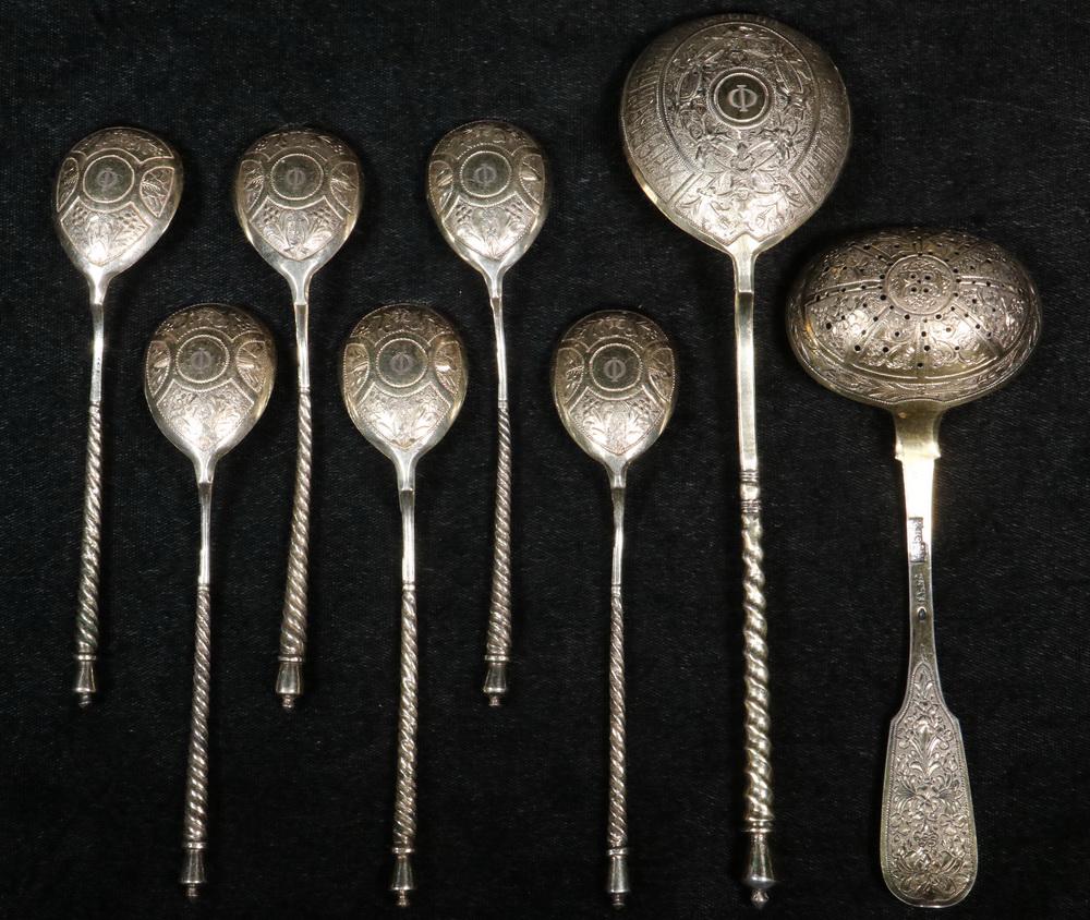 (8) RUSSIAN GILT-WASHED SILVER SPOONS: Group of (8) Late 19th c. Russian Engraved Gilt Washed 84-Silver Spoons, including: Sifter spoon, 1874 Moscow, assayer V. Savinsky, by silversmith Anton Chevarzin, with ornate engraved decoration to h