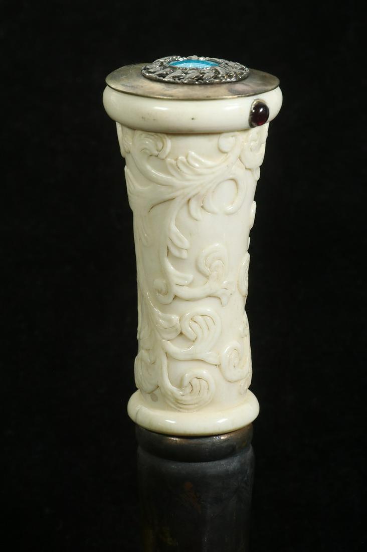 COMPLEX WALKING STICK WITH FINELY CARVED BONE TOP &: Gentleman's Blackwood Straight Evening Cane in three sections that screw together for the ease of the traveler, the top with lithograph face of compass featuring a fleur-de-lis, 36" long. Good conditi