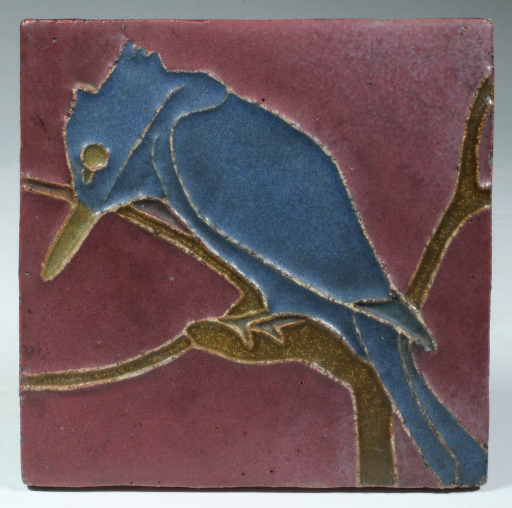 VAN BRIGGLE POTTERY BIRD TILE: Early 20th c. Art Pottery Kingfisher Tile by Van Briggle (Colorado Springs, CO), decorated in cuenca technique in matte glazes, depicting the bird perched on a branch, unmarked, 6" square. Good condit