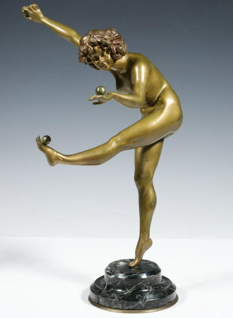 CLAIRE JEANNE ROBERTE COLINET (FRANCE, 1880-1948): "Juggler", gilt bronze figure of a nude woman balancing balls on her foot and hands, signed on the marble base, 15 1/2" tall. Light crack on her lower leg, wear to gilding.