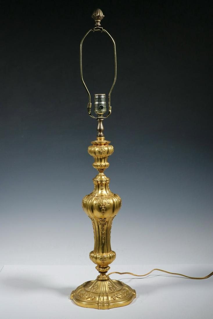 GILDED BRONZE TABLE LAMP, MANNER OF E.F. CALDWELL: Early 20th c. Louis XV Style Heavy Gilded Bronze Lamp Base, in the manner of lamps by E.F. Caldwell, with later electrical fitting, pale copper color felted vase, single socket fixture with harp and f