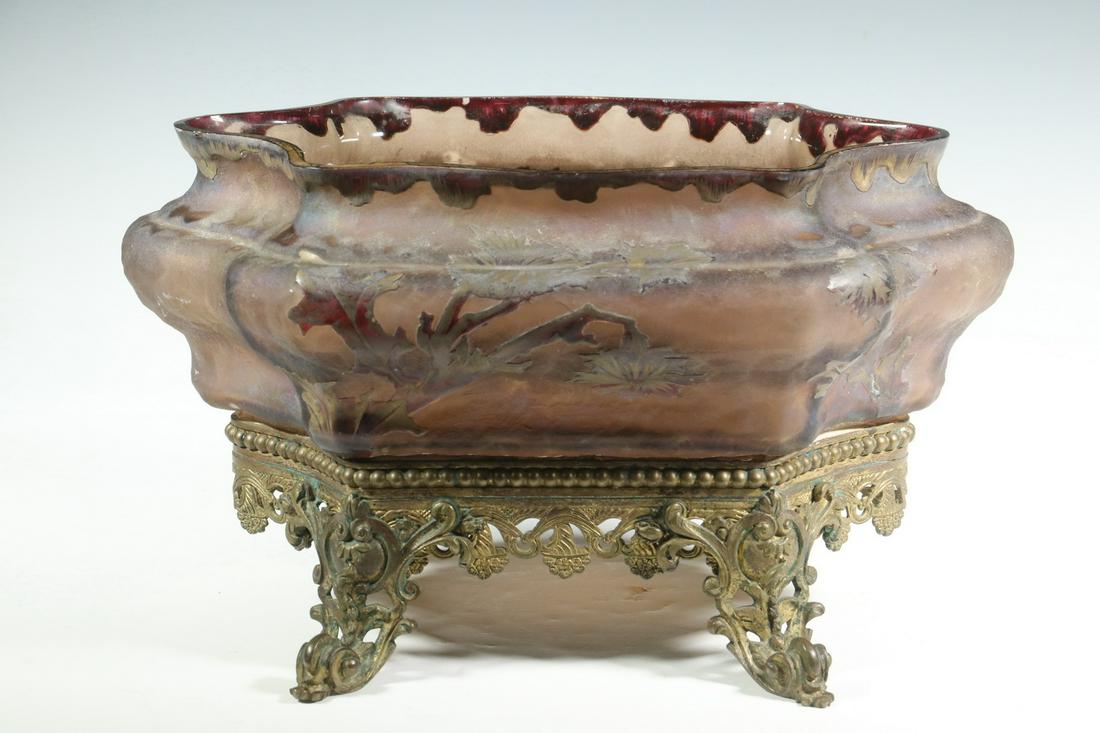 BRONZE MOUNTED CAMEO GLASS JARDINIERE: Late 19th c. Continental Iridescent Art Glass Shaped Bowl on Openwork Gilded Bronze Base, possibly by Loetz, frosted and burgundy glass with carved floral decoration and exterior silver overlay, clear