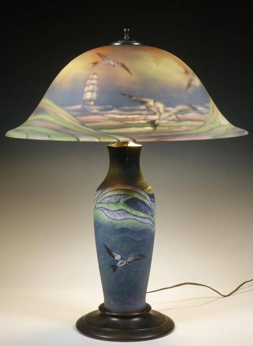 PAIRPOINT SEAGULL TABLE LAMP: Reverse Painted Glass "Seagull" Table Lamp by Pairpoint, early 20th c., with Copley style shade edge with artist signature 'F. Rae' and marked '28-D-3000-86520: Copley", matching glass pedestal set in