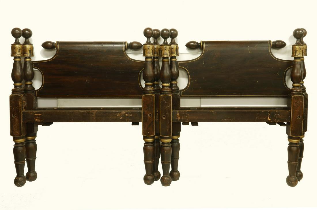 PR PAINT DECORATED CANNONBALL BEDS: Pair of 19th c. Grain Painted and Stencil Decorated Twin Beds, (probably Paris Hill, ME) with rolling pin form headboards, with side rails and foot panels, 49" high, 79" x 42". Repaired break to one h