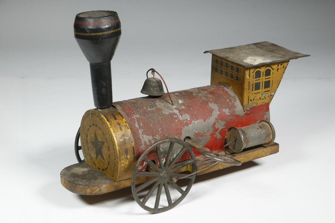 19TH C. GEORGE W. BROWN NIAGARA CLOCKWORK TOY: Circa 1880s Hand Painted and Stenciled Toy Floor Train Engine, by George W. Brown, Forestville, CT, in wood and tin plated sheet metal, with bell, cast iron wheels, with key, 7 ¼" high, 10" x 4