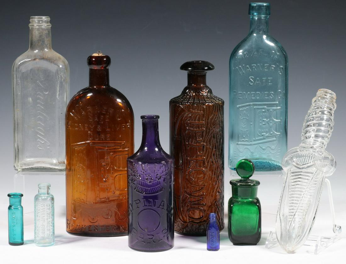 (10) COLLECTIBLE BRANDED BOTTLES AND FLASKS: Group of (10) Late 19th - Early 20th c. Collectible Bottles, incl: Tippecanoe Bitters, H.H. Warner & Co., Rochester, NY, c. 1880s, in dark brown amber, 9 1/4" high; E.D. Pinaud, Paris cologne bottle,