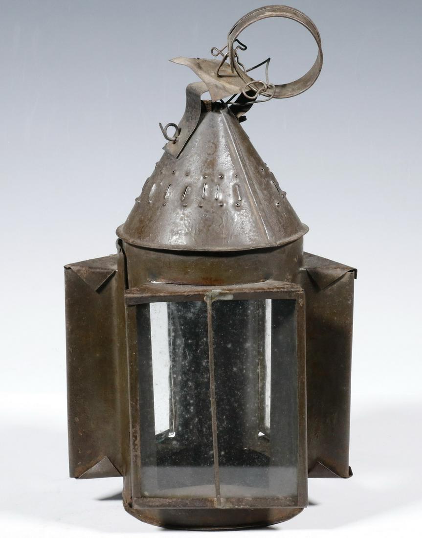 PUNCHED TIN TRIPLE PANE CANDLE LANTERN: 19th c. Punched Tin Candle Lantern, with three glass window panels, ring carry handle, punch decorated conical top, single hinged door opening, original candle socket, 13" high, 6 1/2" diam. Solder re