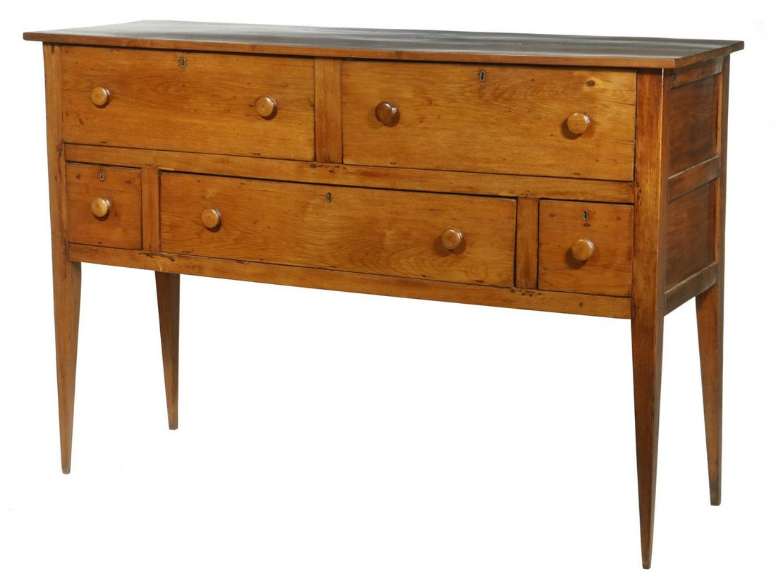 SOUTHERN HUNTBOARD: Southern Huntboard, with overhanging top, two side by side drawers over a center deep drawer flanked by bottle drawers, all with mushroom knobs and locks, pine secondary, raised on thin tapered legs, 