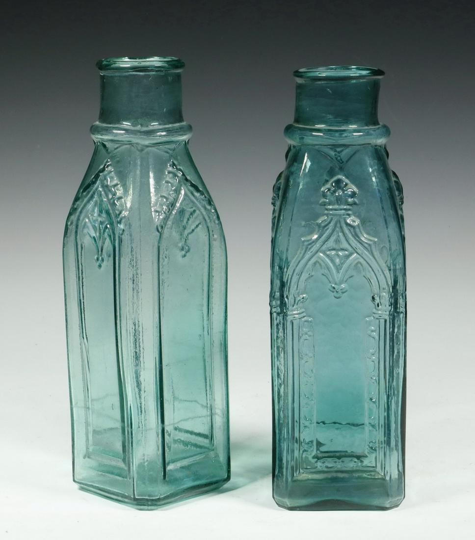(2) BLOWN MOLDED CATHEDRAL / GOTHIC PICKLE JARS: Lot of (2) Late 19th c. Pickle Jars, square shape with molded Gothic window style decoration, incl: Green color jar, each side with palmette topped 'window', trefoil central pendant, and C-scroll side