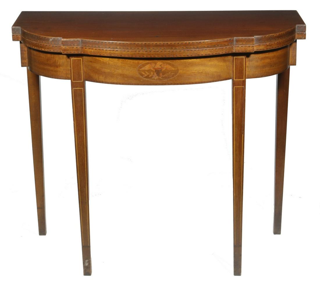 HEPPLEWHITE INLAID CARD TABLE: 19th c. Blocked Bow Front Mahogany Gaming Table with boxwood and ebony edge banding, raised on square tapered legs, the back providing gate for the hinged top. 31" x 36" x 18". Some stains to top.