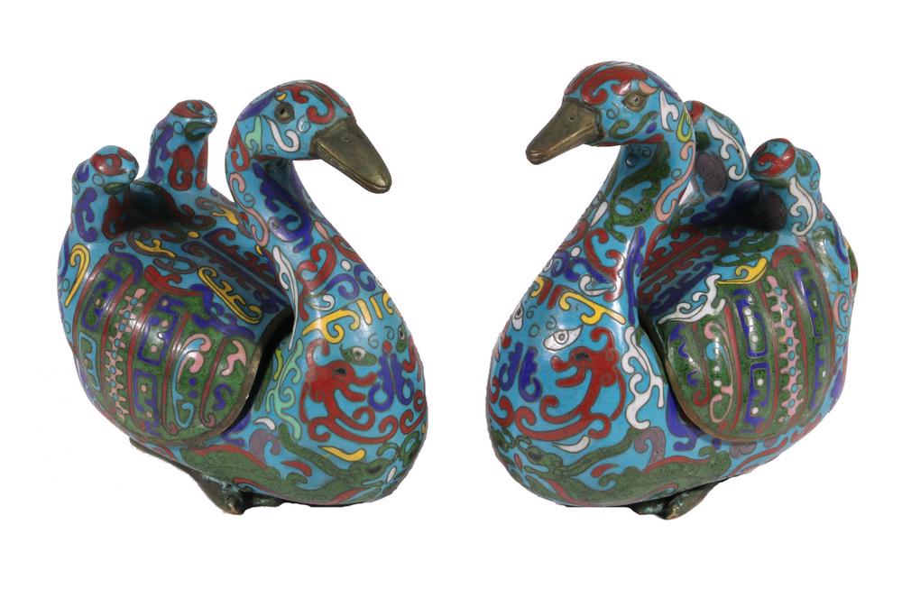 PR CHINESE CLOISONNE GOOSE FORM BOXES: Pair of Chinese Cloisonne Goose Form Censers or Boxes, early 20th c., enamel on brass, with wings as lids, 5 1/2" high, 5" x 3 1/4". Minor surface wear, a few tiny areas of enamel loss on base.