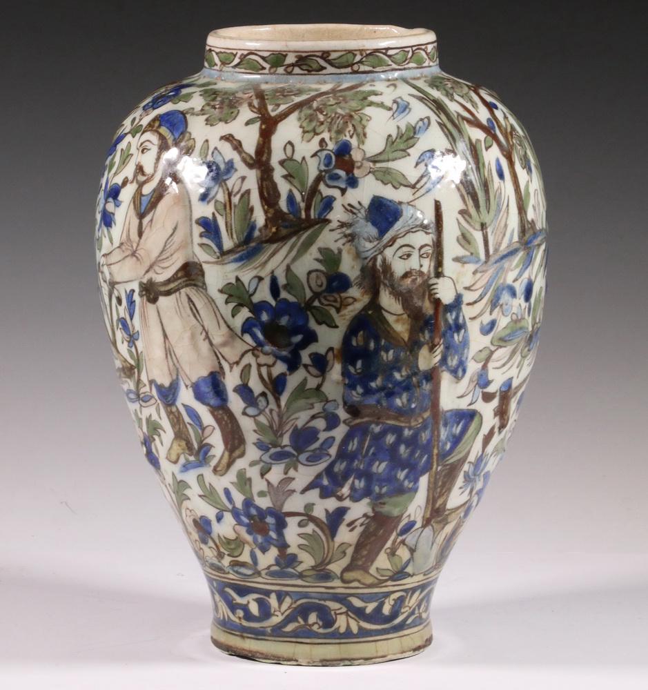 19TH C. PERSIAN POTTERY VASE: Qajar Period Persian Vase with green, brown and blue glazed raised decorations of men farming, including one with ox and drawn plow, one with axe and another with spade with donkey beside. 12 1/2" x 8