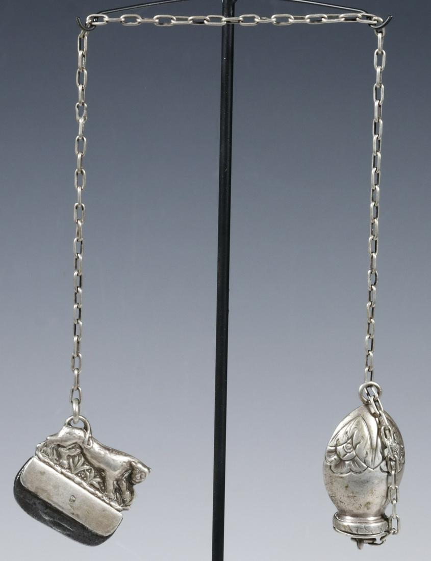 MEXICAN SILVER FLINT STRIKER ON STAND: Mid-18th to Early 19th c. Spanish Colonial Tinder Box, Striker and Chain: the tinder box body (in 79% silver) with removable lid and engraved floral decoration, 2 3/4" high, 1 3/8" x 3/4"; the striker