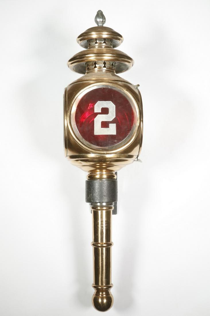 DEVOURSNEY BRO'S FIRE COACH LANTERN: 19th c. Copper Fire Wagon Coach Lantern by Devoursney Bro's, (389 Broome St., New York), with beveled glass front and side panels, front panel in ruby flashed glass with engraved '2', interior with ca