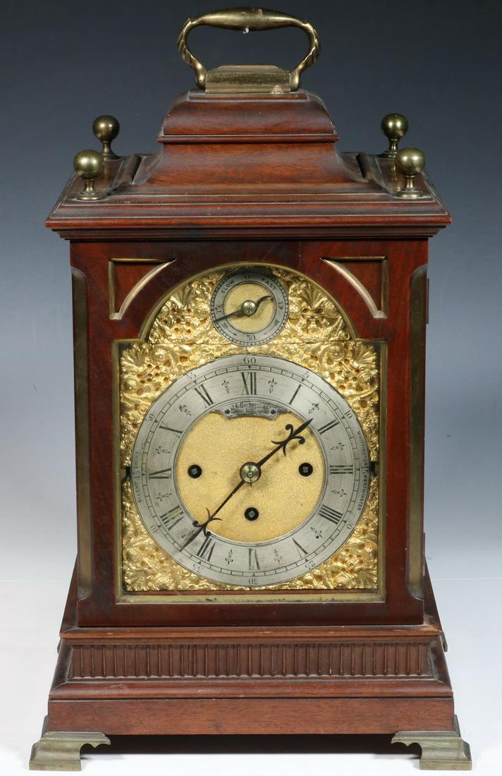 J.E. CALDWELL & CO. DUAL CHIME BRACKET CLOCK: Late 19th c. Brass Mounted Mahogany Mantel Clock, retailed by J.E. Caldwell & Co., 8-day movement with Westminster and Whittington chimes, with pendulum and key, fast/slow subsidiary dial, dial with s