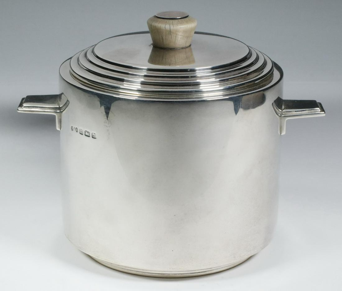 ART DECO SILVER BISCUIT BARREL: English Art Deco Sterling Silver Biscuit Barrel, by Hukin & Heath Ltd., Birmingham 1933, #2434A, cylindrical shape with stepped lid and stepped side handles, marked 'Made in England' on base, 5 1/2" h