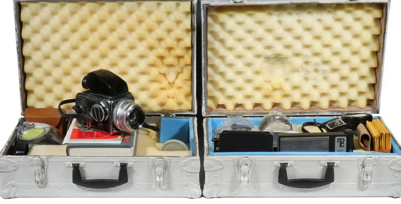 HASSELBLAD 500C CAMERA OUTFIT WITH (5) LENSES & MANY: One Hasselblad 500C camera body with leather neck strap; Three film magazines: Two A12 film magazines and one earlier 12 exposure magazine; Custom-made leather case to hold one film magazine belt with