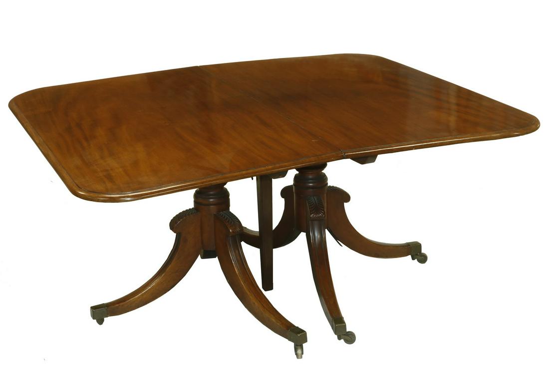 TWO-PART DOUBLE PEDESTAL DINING TABLE W/ (2) LEAVES: Duncan Phyfe Style Table, having a molded edge rounded corner top, with heavy ring and urn turned stanchions resting on tripod feather carved top sabre legs with beaded edge, terminating in brass capp