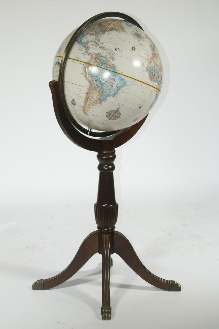 CONTEMPORARY REPLOGLE FLOOR GLOBE: Contemporary World Globe with metal chapter ring, set on mahogany Duncan Phyfe style base; Replogle World Classic Series. 42" high, 20" x 16" diam. Good condition.