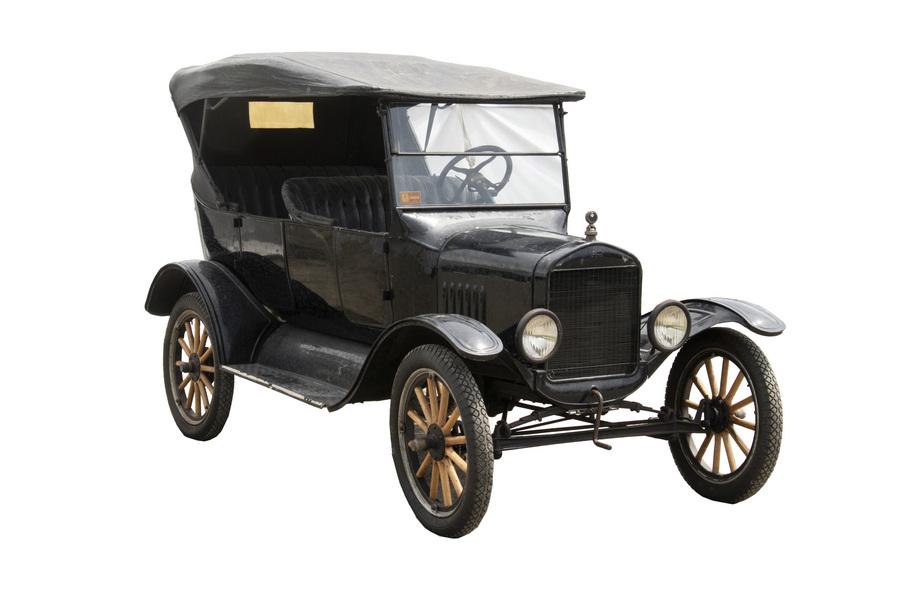 1924 FORD MODEL T TOURING CAR: Named "Elizabeth" by owner (who was the second owner), owned for 62 years, driven under 30,000 miles, always garaged. All original parts, including additional engine block and transmission, original m