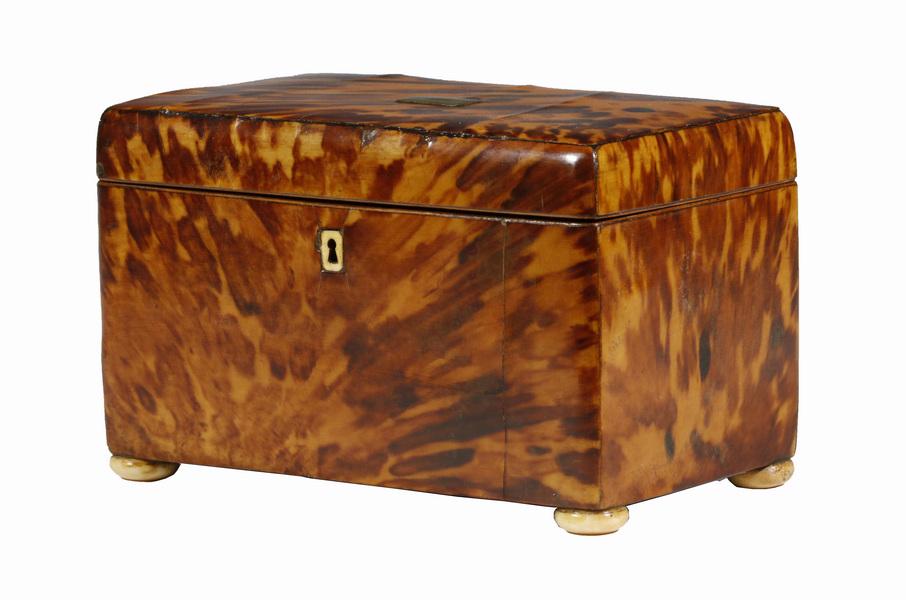 TORTOISESHELL TEA CADDY: 19th c. Rectangular Tortoiseshell Tea Caddy, with silver lid escutcheon (no monogram), bone lock escutcheon (no key), set on button form feet, velvet lined lid, interior with two tortoiseshell veneere