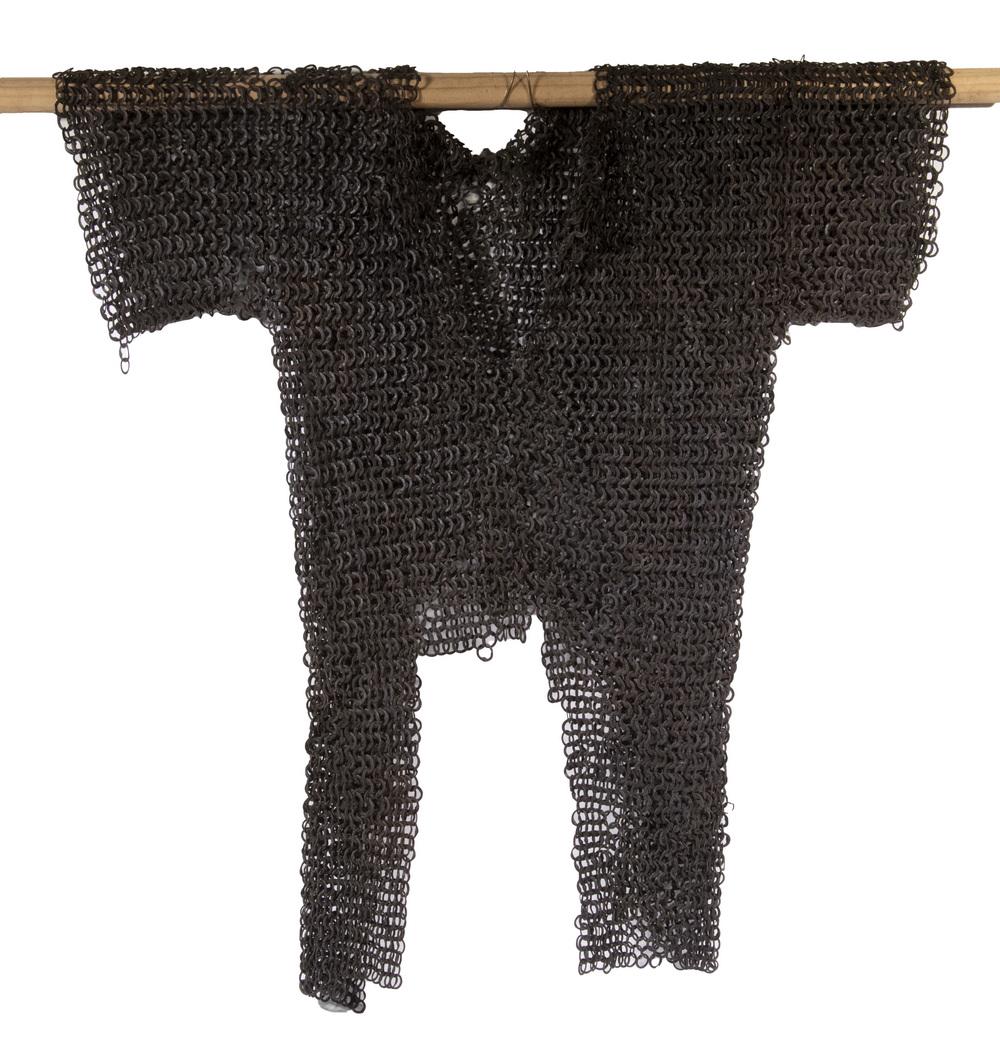 16TH C. SPANISH CHAIN MAIL HAUBERK: Coat of Mail, comprised of double lapped flat riveted engraved iron rings, 33" tall, 29" cuff to cuff. Some corrosion.