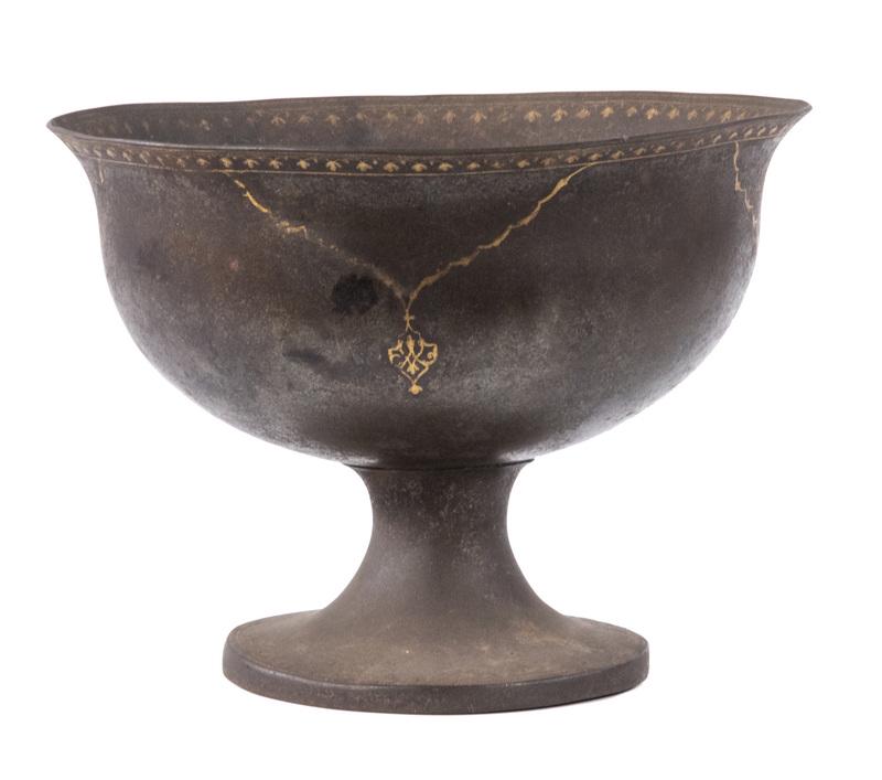 PERSIAN SAFAVID DAMASCENED BOWL: Safavid Period (1502-1736) Iron Bowl, thin construction with gold overlay leaf and drop pendant decoration to interior and exterior surfaces, flared rim, 6 1/2" high, 9 1/4" diam. Surface wear commens