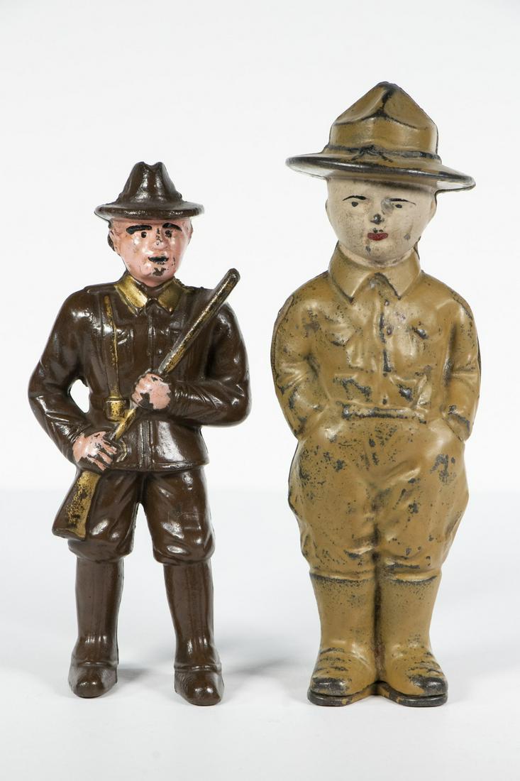 UNIFORMED FIGURE CAST IRON STILL BANKS (1 of 2)