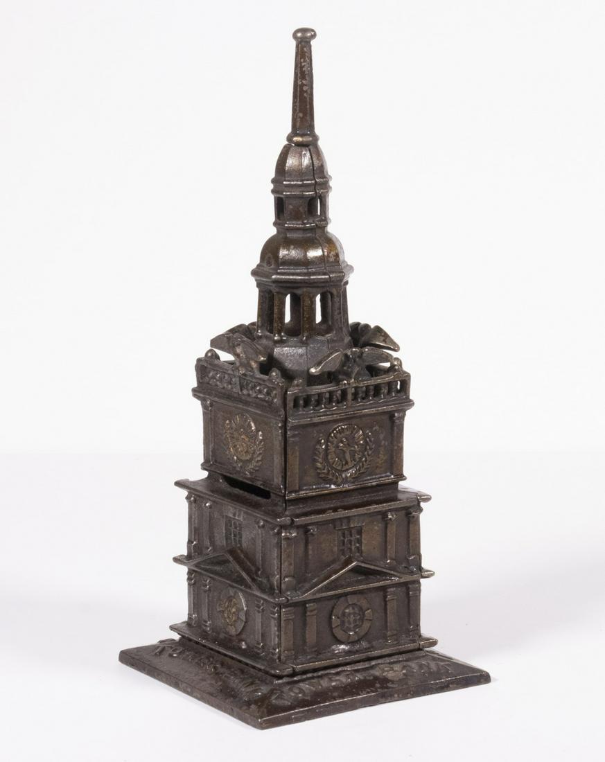 CAST IRON "TOWER BANK" STILL BANK (1 of 2)