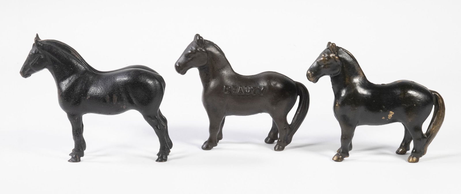 (3) STANDING HORSE IRON STILL BANKS (1 of 2)