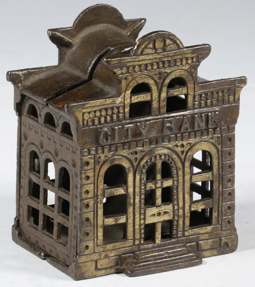 CITY BANK WITH DIRECTOR'S ROOM STILL BANK: Circa 1902 Cast Iron Still Bank, made by John Harper & Co., Ltd., England, with original surface, original flat head screw, 4" high, 3 1/2" x 2 1/4". Minor finish loss. Provenance: From the estate of 
