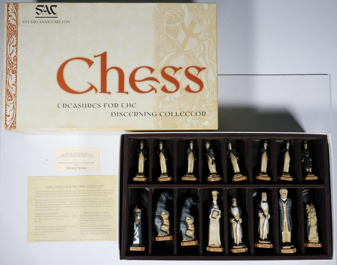 STUDIO ANNE CARLTON MODERN SHERLOCK HOLMES CHESS SET: Handcrafted, made in England. Pieces range from 3 1/2"- 5 1/4". New condition; board not included. Provenance: From the Mead Family estate, Islesboro ME.