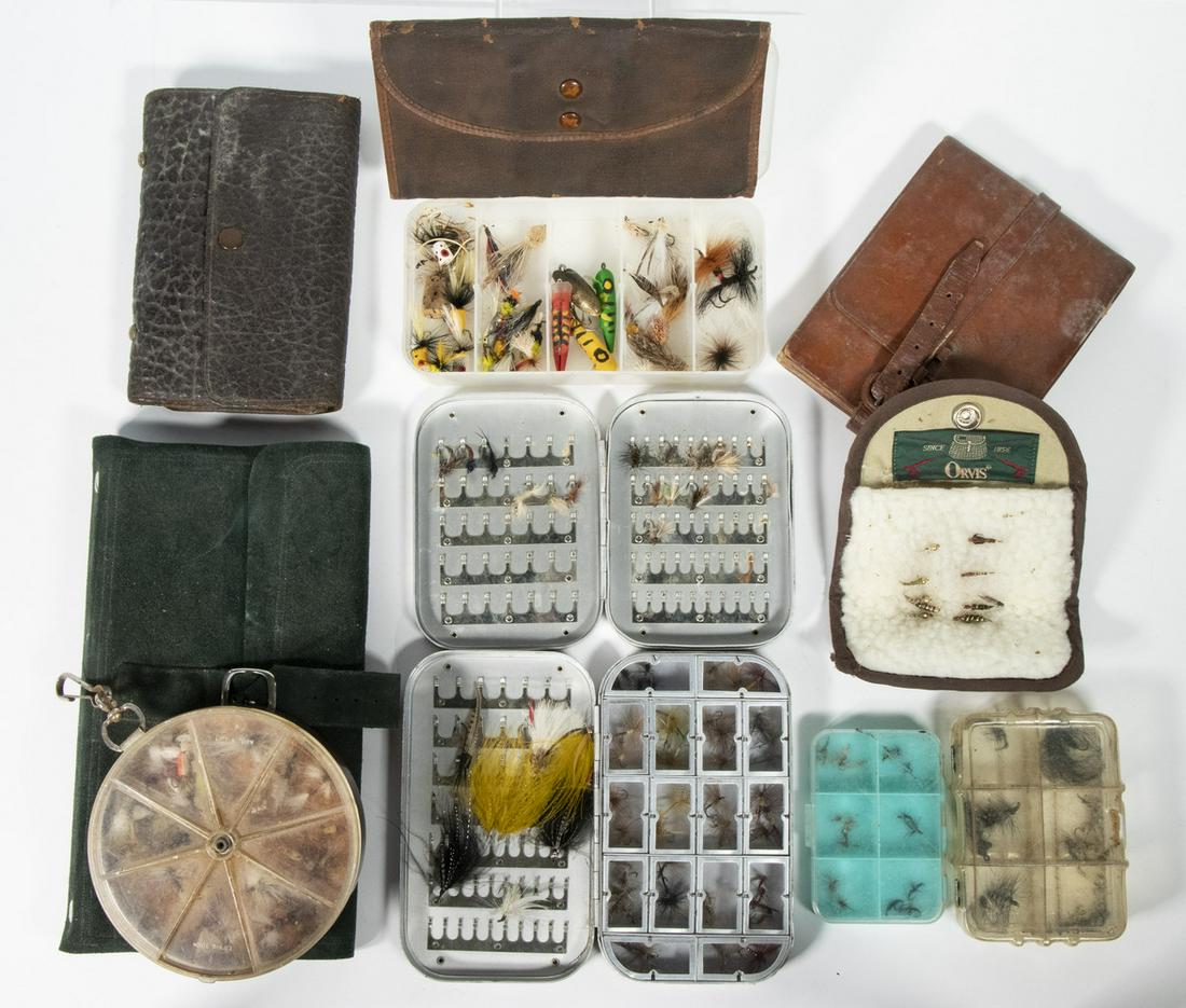 (11) PURSES AND CASES OF FISHING FLIES: Including: (5) leather or cloth purses, the largest in green leather from Scotland, theses are MOSTLY EMPTY; PLUS (2) 'Wheatley Silmalloy Metal, one engraved "Scotland, 1976"; PLUS (4) Plastic cases, 