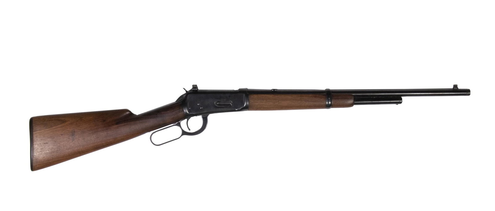 WINCHESTER MDL. 94 RIFLE, .30-30: Short magazine Winchester model 94 lever action rifle fitted with aftermarket Redfield rear peep sight. Receiver and barrel have blued finish with minor signs of wear. The walnut foregrip and buttstoc